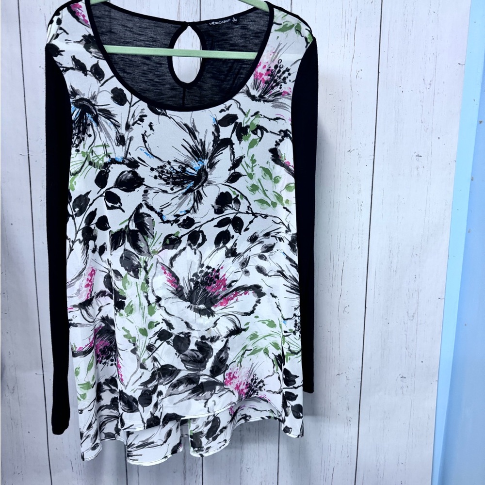 Long sleeve Miraclesuit tunic top. Comfortable and flattering.